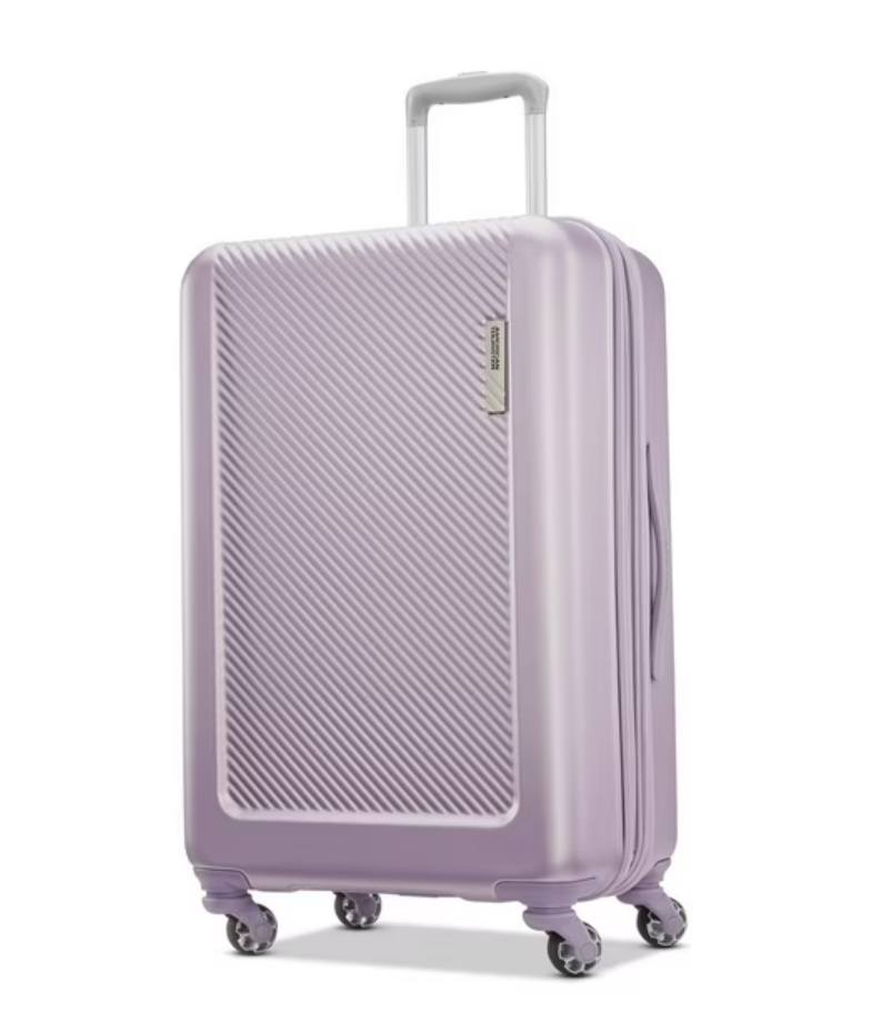 Purple suitcase with a textured surface