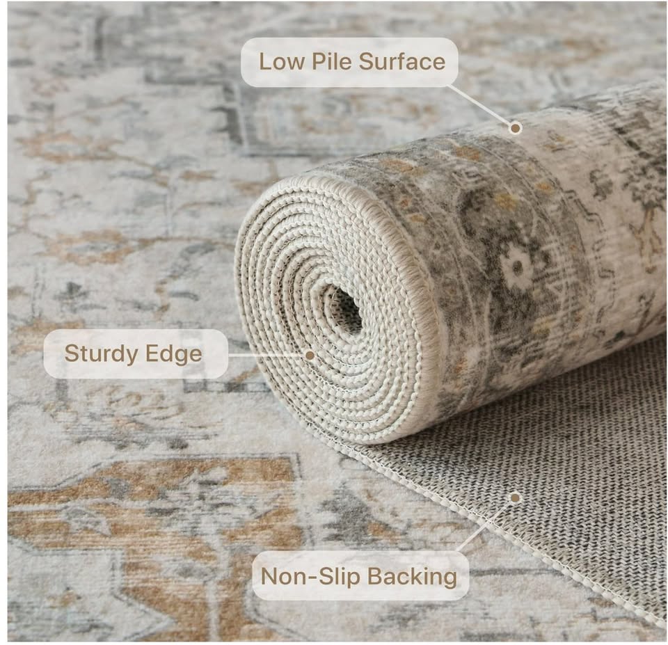 Rolled-up rug with text labels on a textured surface