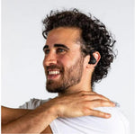 Man wearing black earphone