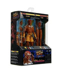 Action figure in packaging with 'Dhalsim'