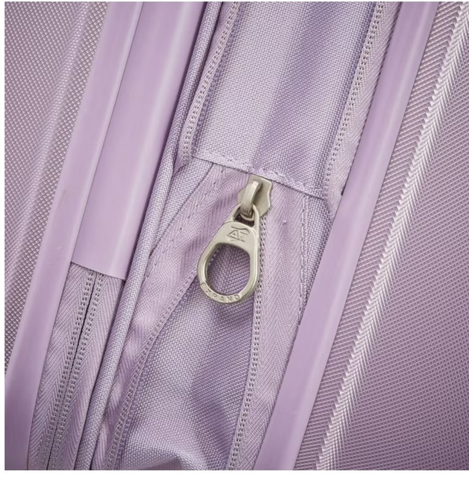 Close-up of a purple backpack with a zipper detail