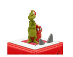 Green character with a red hat on a red platform with shark fins