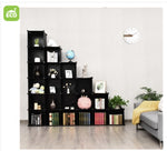 Black bookshelf with decorative items in a living room setting, featuring the 'Eco' brand logo.