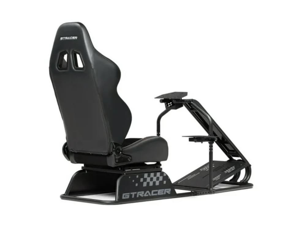 Black racing simulator seat with steering wheel base