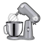 Silver stand mixer with a metal bowl and a whisk attachment