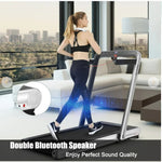 Women running on treadmill with double bluetooth speaker