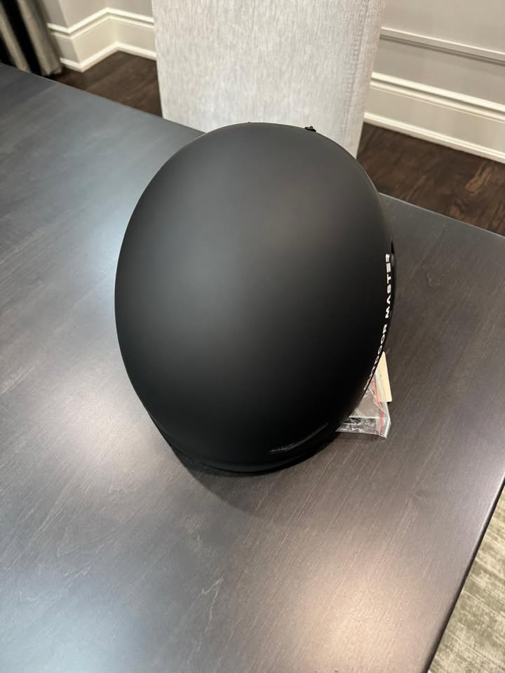 Black helmet with MIPS technology showing its above part 