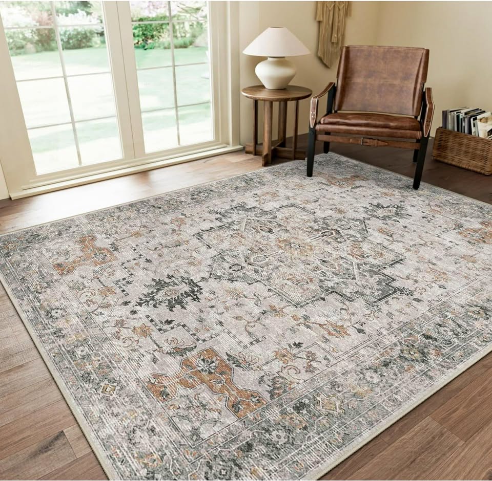 Patterned rug in a room with a chair and lamp
