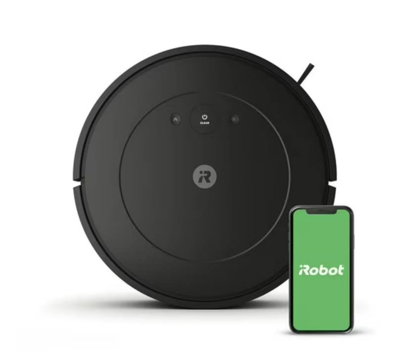 Robotic vacuum cleaner with smartphone displaying iRobot app