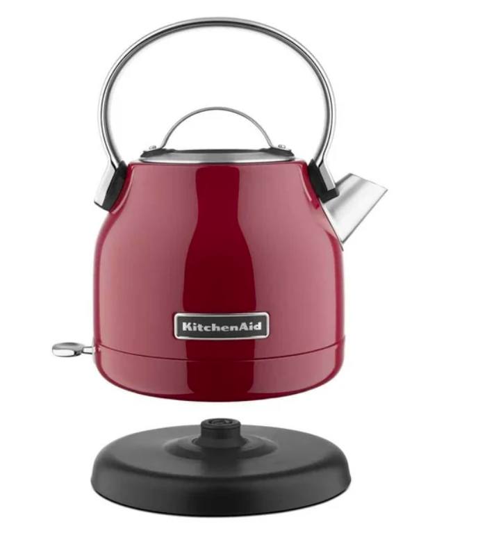 Red electric kettle with a black base 