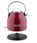 Red electric kettle with a black base 