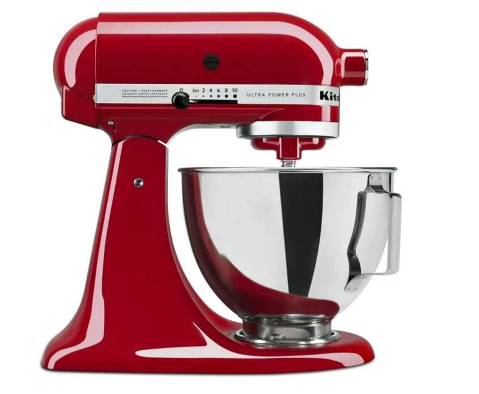 Red KitchenAid stand mixer with a silver bowl