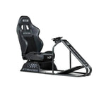 Black gaming chair with steering wheel and pedals